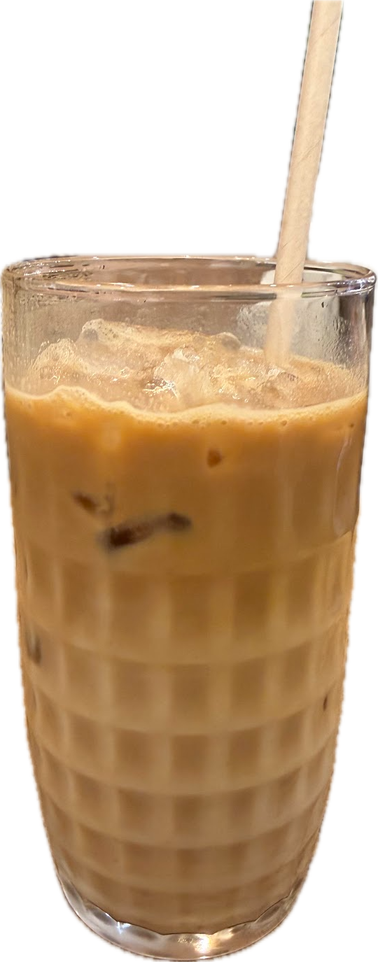A tall iced latte with a straw, shot on its own